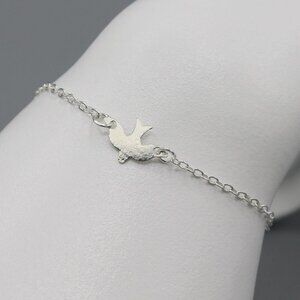 Jewelry bracelet dove bird dainty silver tone modern minimalist design fashion